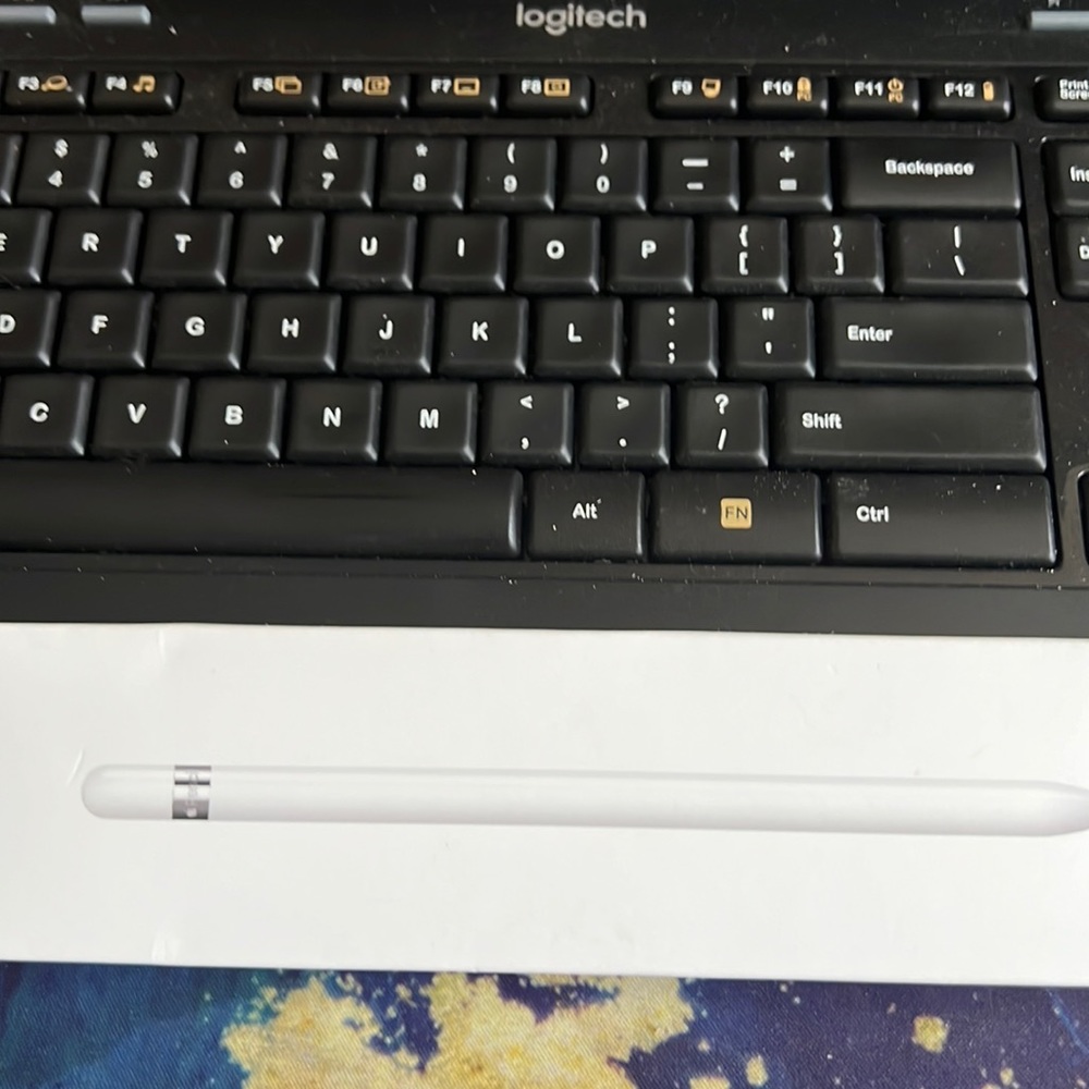 First Gen apple pencil in box with additional point and instructions